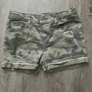 Never been worn, children’s size 16 camo denim shorts.